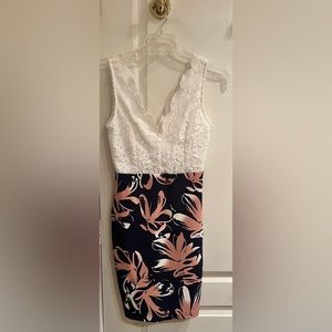 Cals dress size small. Worn once. Fits like a glove so comfortable.